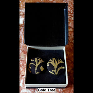 Gold tree print button earrings in jewelry box
