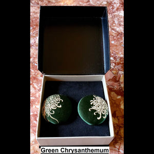green chrysanthemum print button earrings in jewelry box