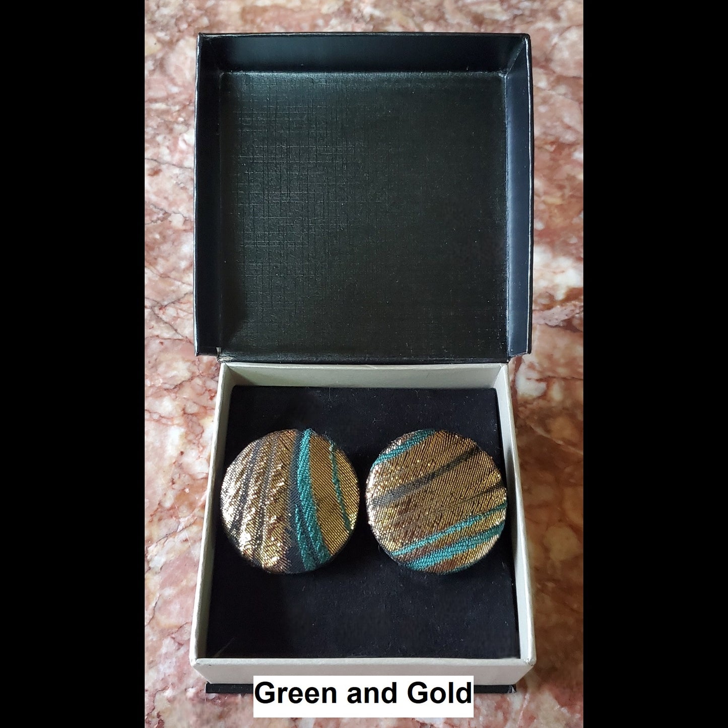 Green and Gold button earrings in jewelry box