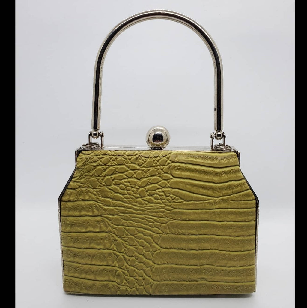 Front view of Lime green hard shell croc embossed purse