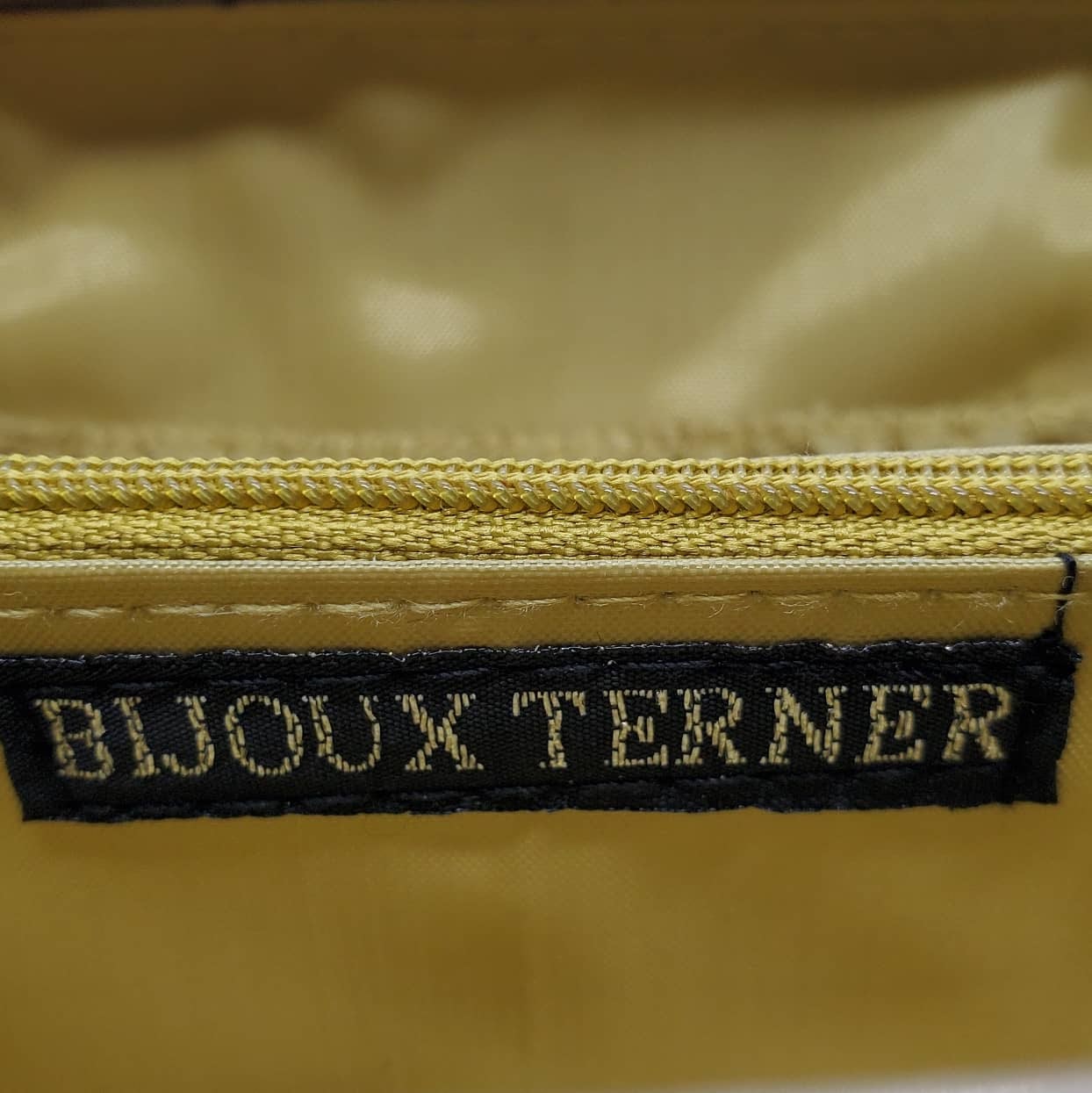 close up view of Bijoux Terner label