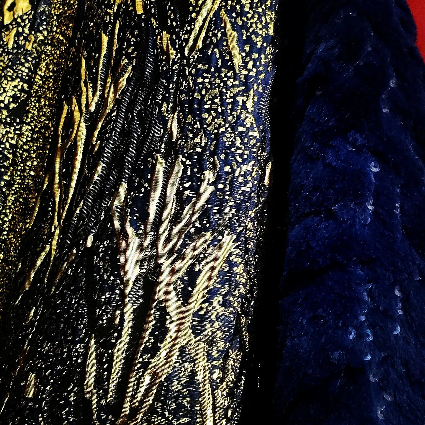 Close of view of jacquard fabric and sequined faux fur