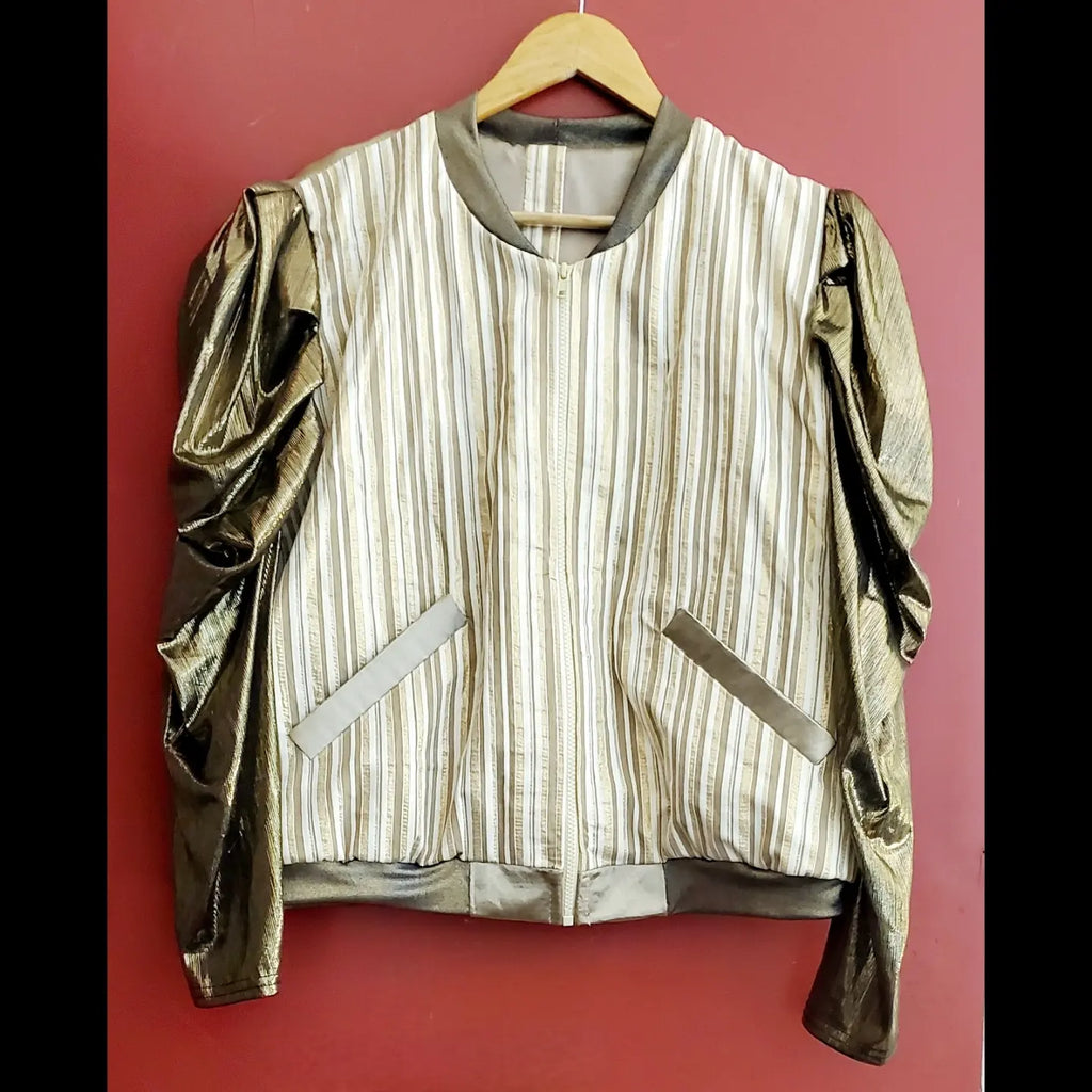 Front view of Gold and ivory striped bomber jacket with gigot sleeves