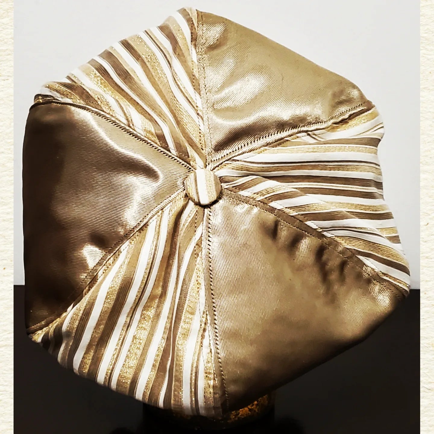 Back view of Gold and Ivory striped newsboy hat