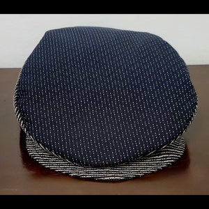 Front View of Brown and black swiss dot and striped flat cap