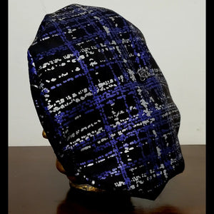 Back view. Silver and Purple plaid beret with chain detail on mannequin head