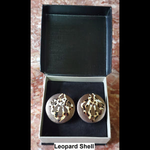 Leopard shell print button earrings in jewelry box