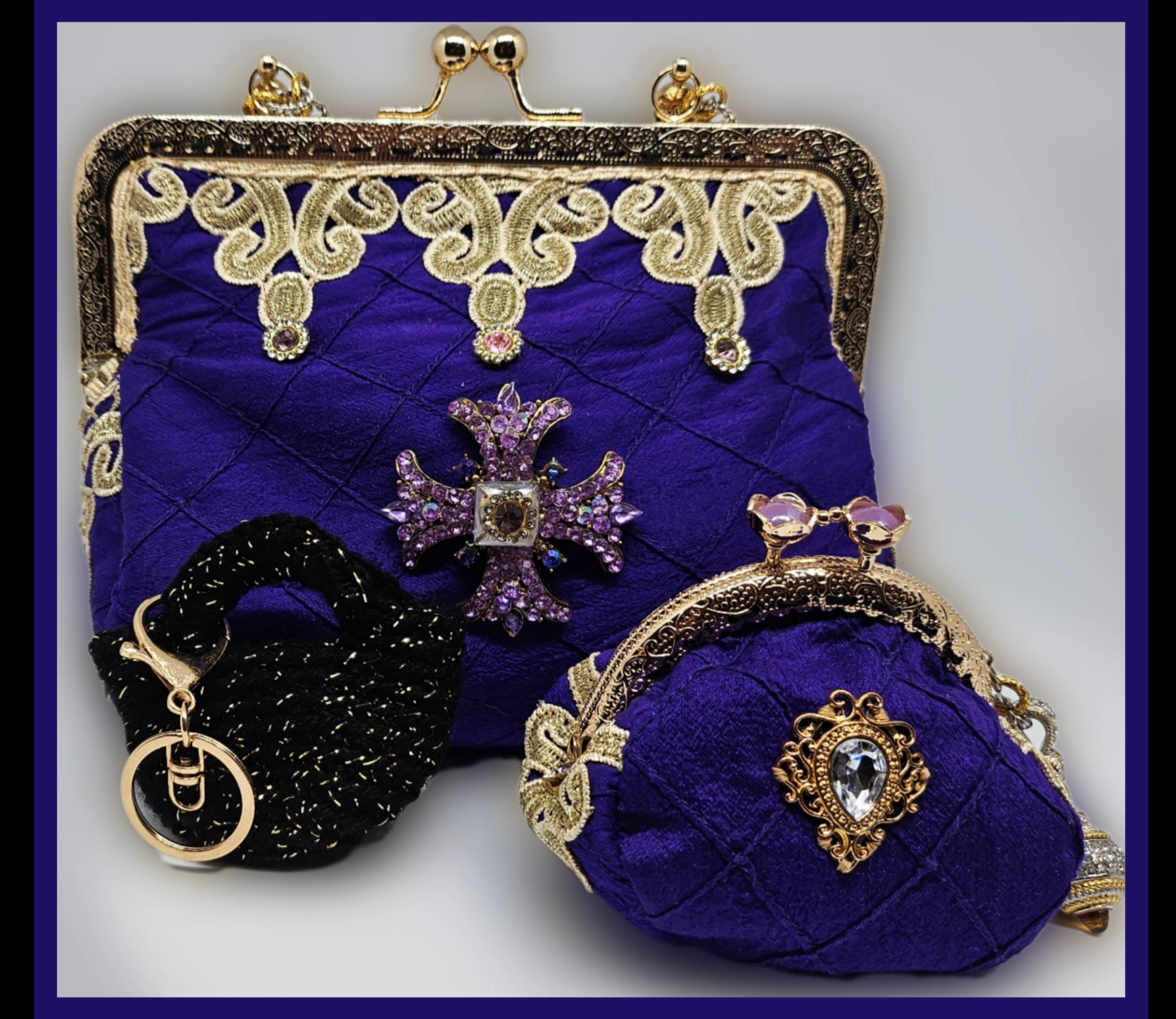 Matching handbag, coin purse, and keychain for Front view of Rhinestone encrusted purple silk bomber jacket with gold lace accents