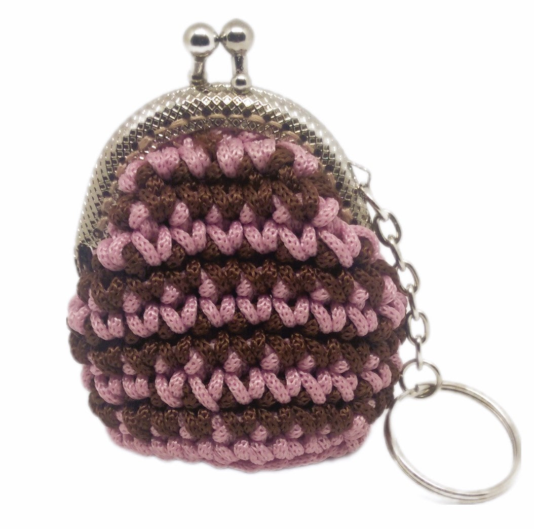 Front view of variegated pink and brown  crochet coin purse keychain with silver kiss clasp frame.