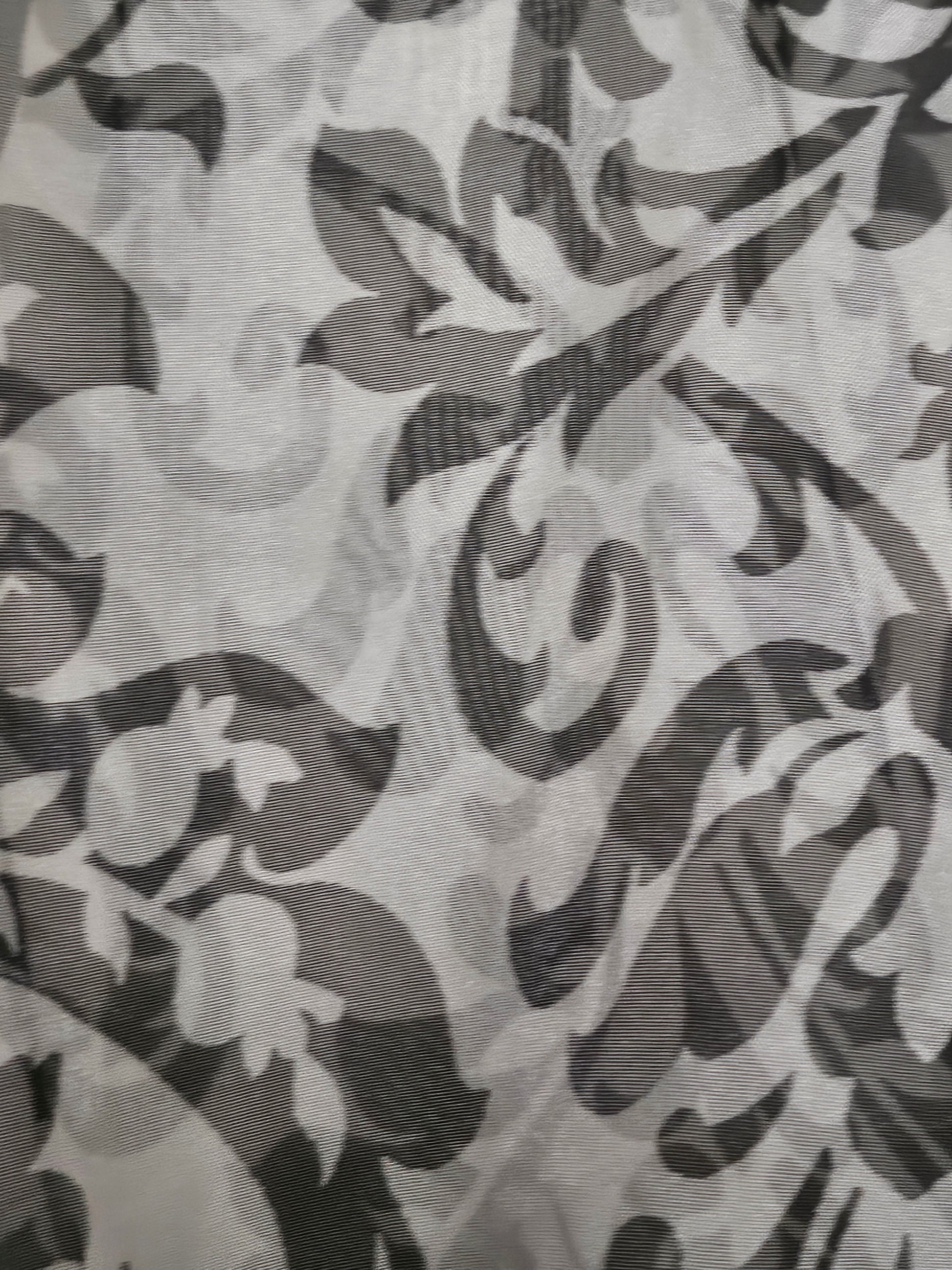 Fabric view of Sheer damask print bomber jacket with pearl and floral accents