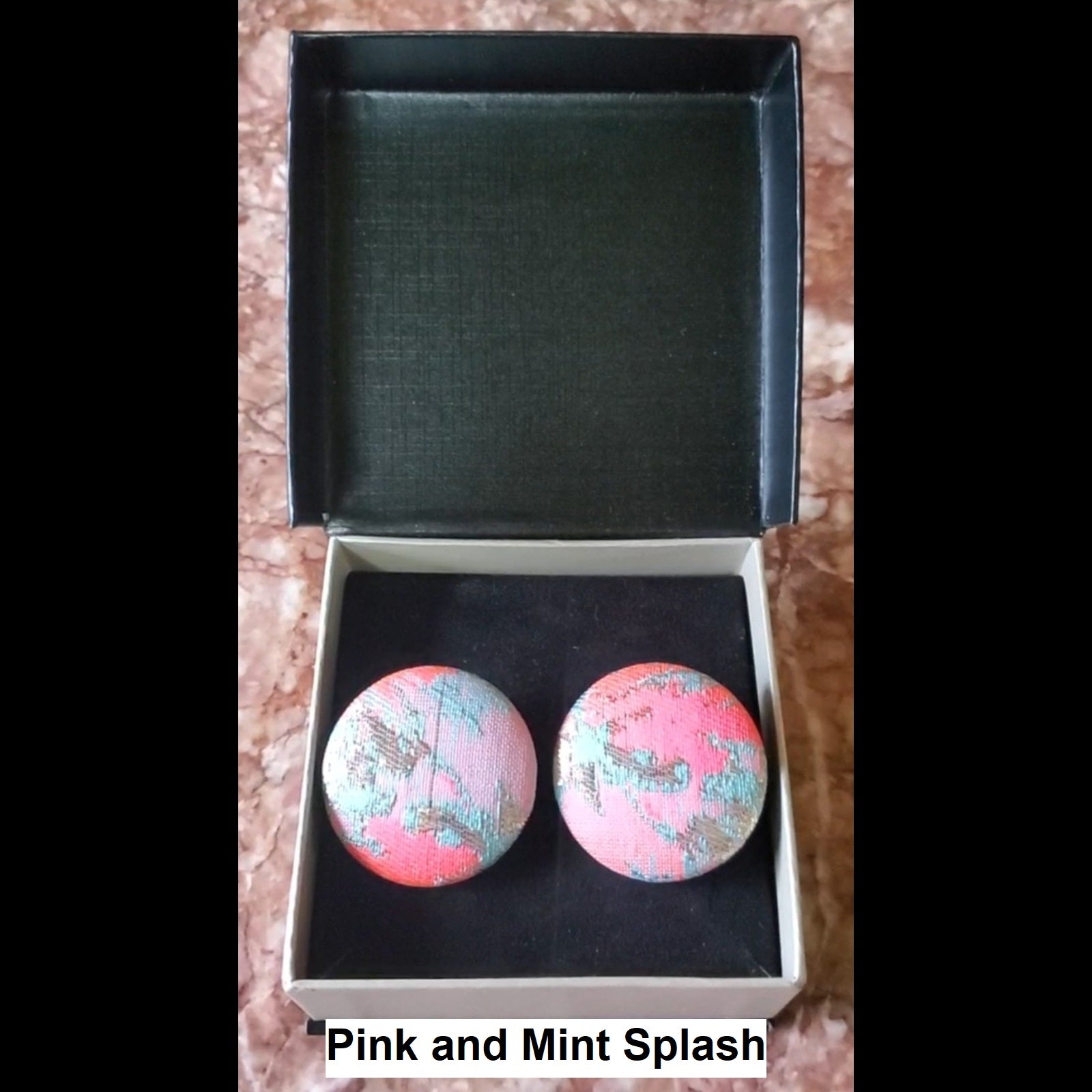 Pink and mint splash print button earrings in jewelry box