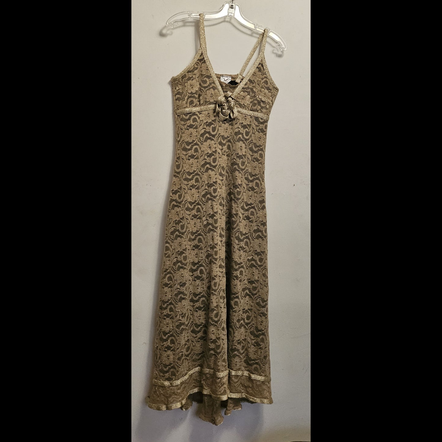 Front view of Lace Cocktail Dress with golden trim rose detail