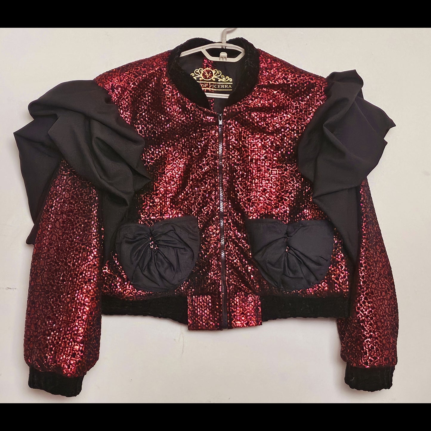 ROUGE- Flocked shimmer bomber with exaggerated sleeves and matching one-of-a-kind pockets