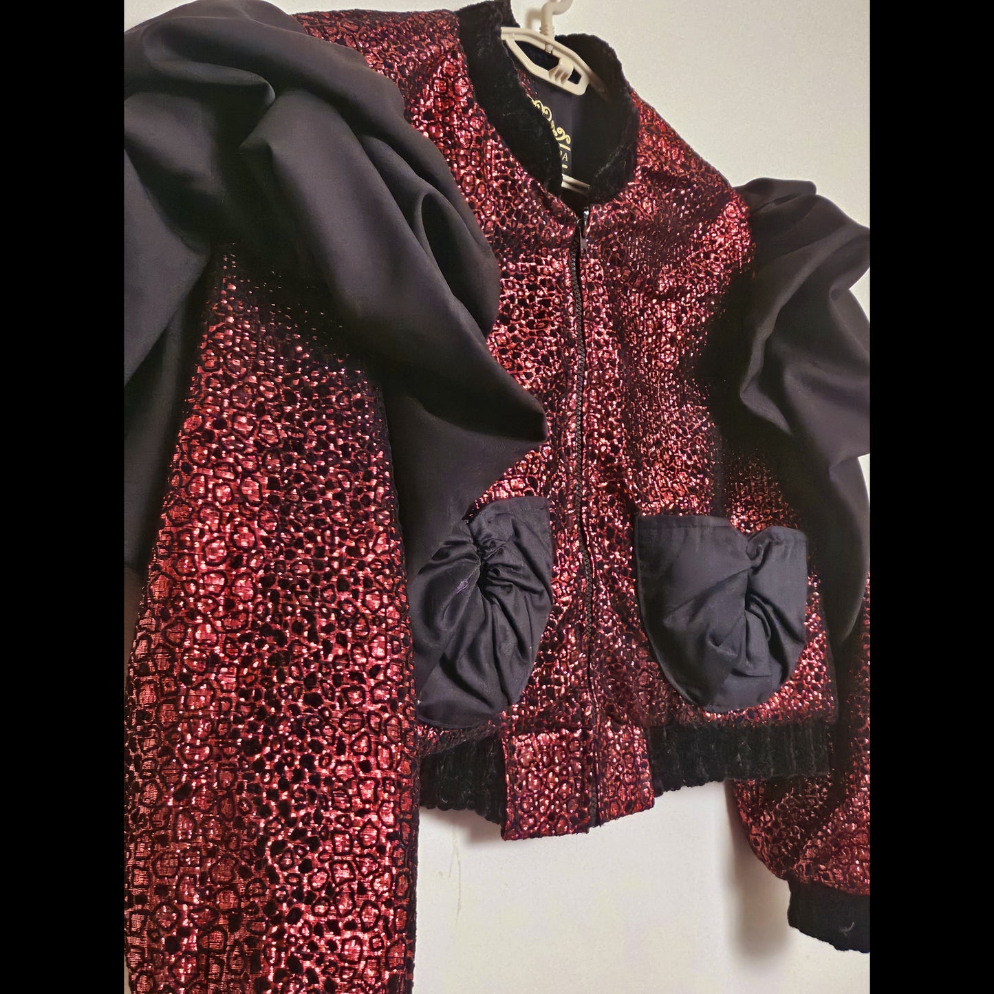 ROUGE- Flocked shimmer bomber with exaggerated sleeves and matching one-of-a-kind pockets