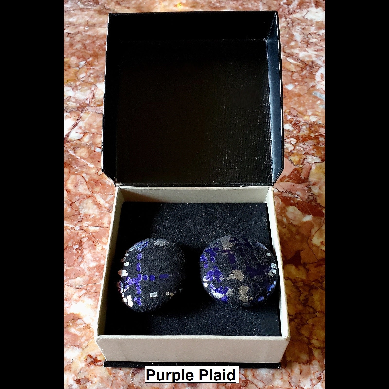 purple and silver plaid print button earrings in jewelry box