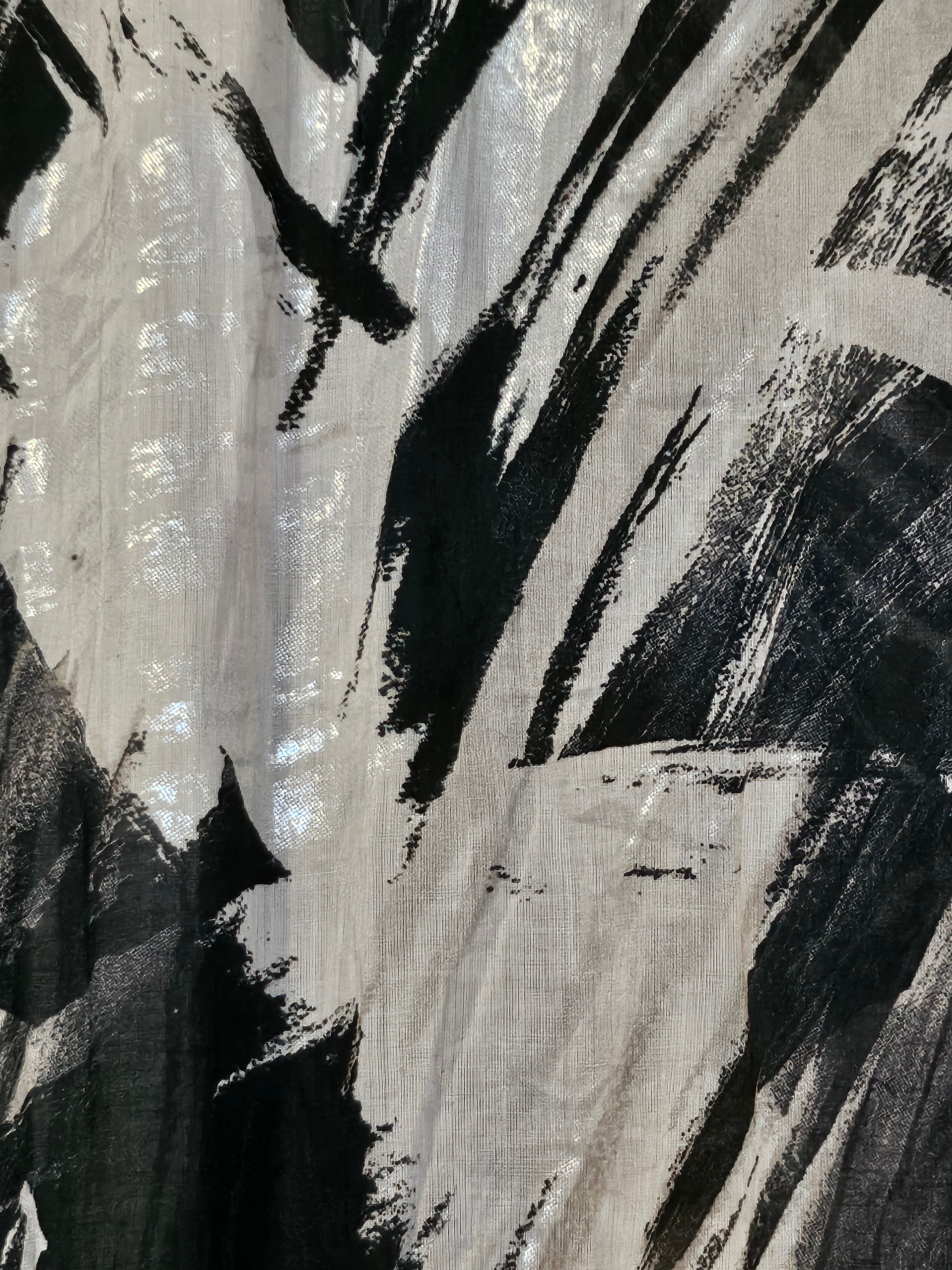 Fabric view of Sheer abstract printed bomber jacket with bowtie detail
