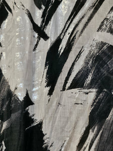 Fabric view of Sheer abstract printed bomber jacket with bowtie detail