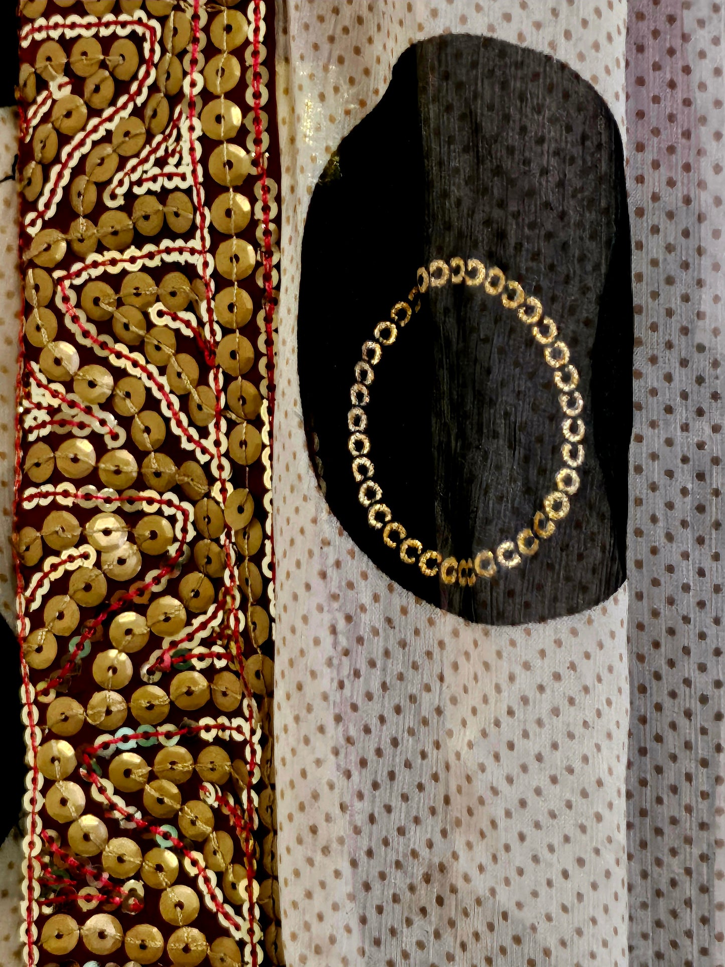 Sleeve fabric view of Indian inspired bomber jacket with sheer cape sleeves