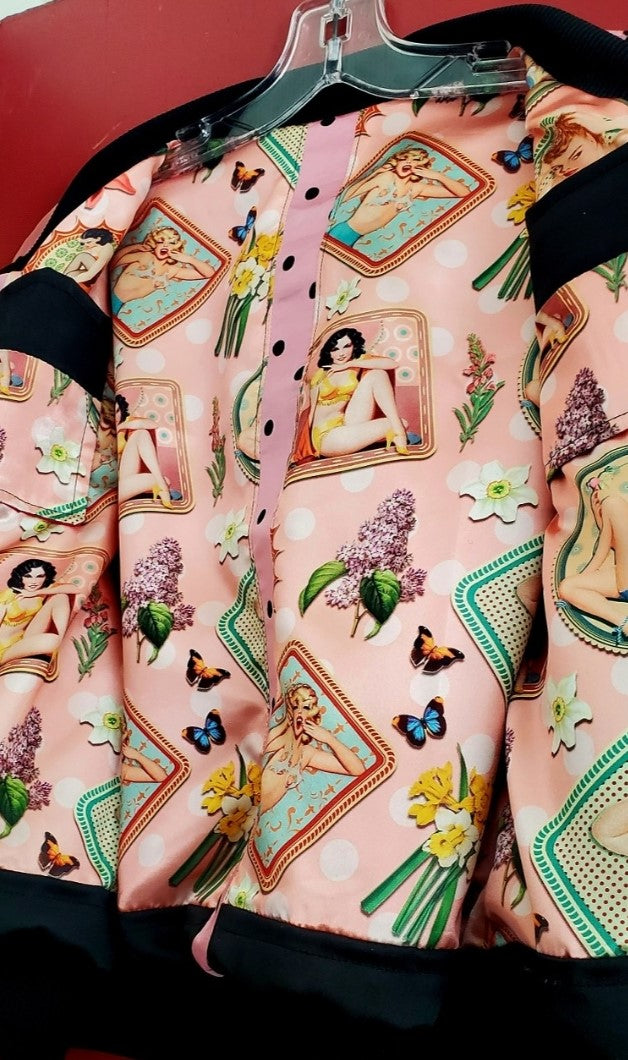 closeup view of pinup lining of pink polka dot varsity jacket