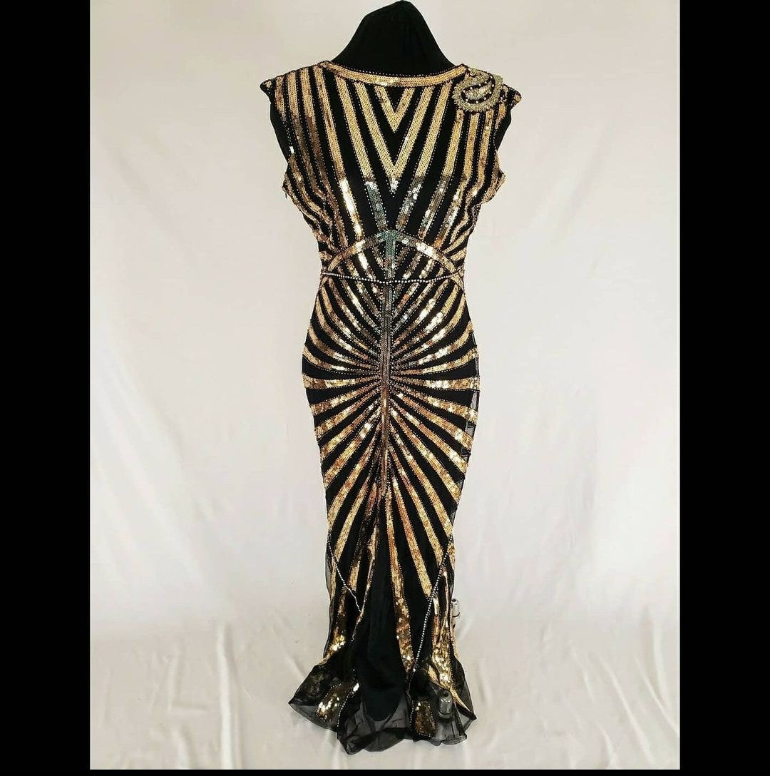 front view of Art Deco-inspired beaded gown with detachable faux fur stole and appliques (without stole)