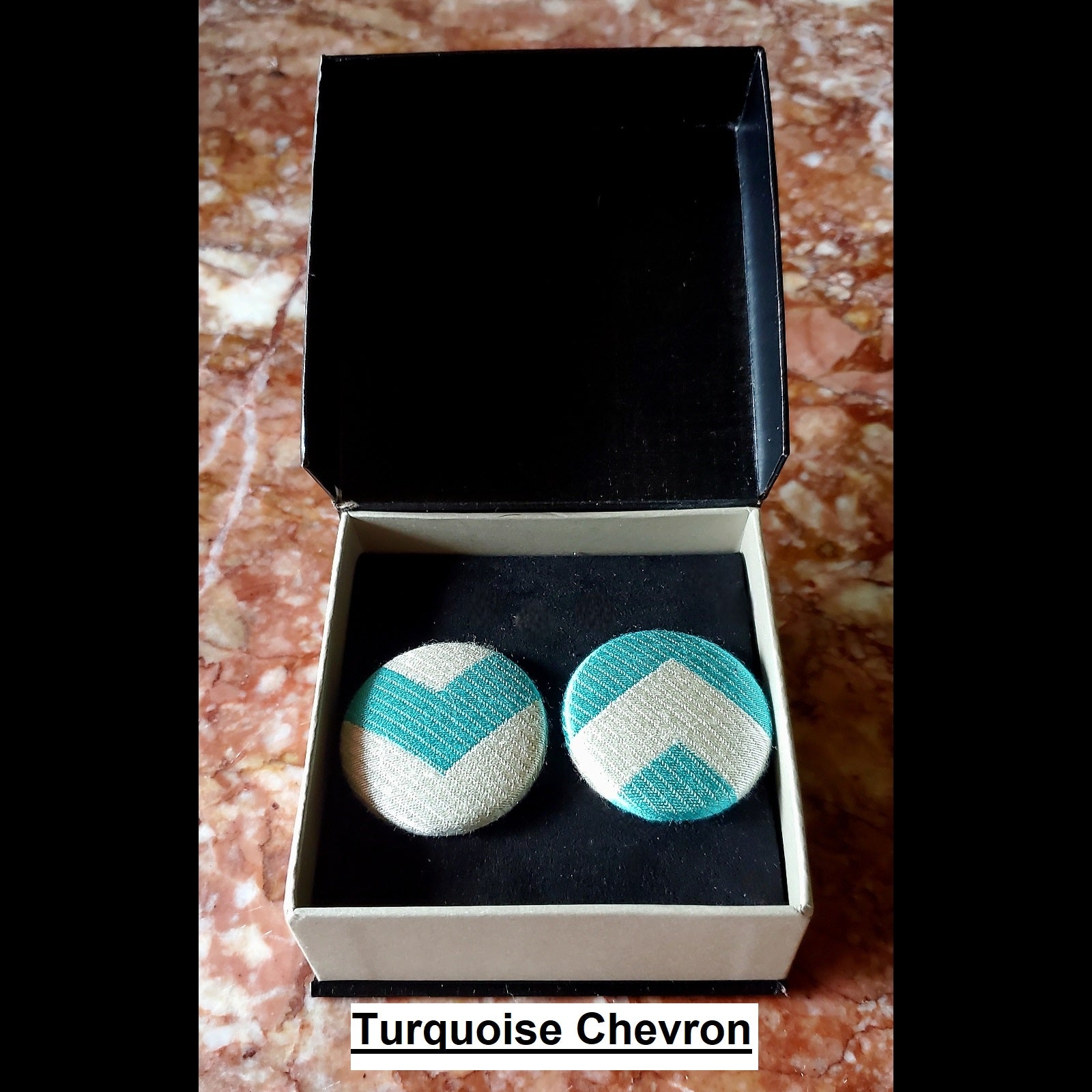 Turquoise and white chevron print button earrings in jewelry box