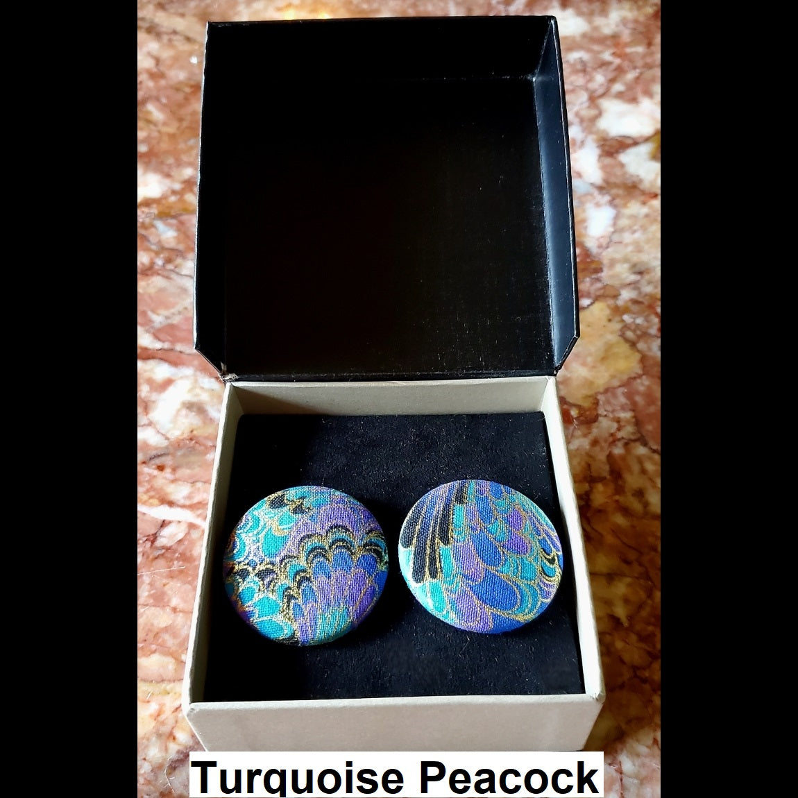 Turquoise and purple swirl print button earrings in jewelry box