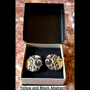Yellow, black and white abstract print button earrings in jewelry box