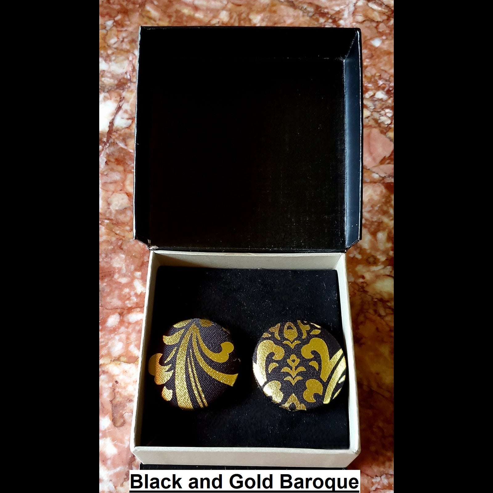 black and gold baroque print button earrings in jewelry box