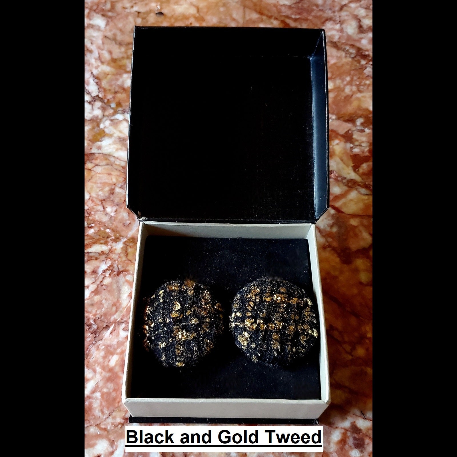 Black and gold tweed print button earrings in jewelry box