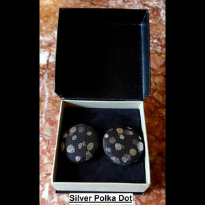 Silver polka dot print button earrings in jewelry box