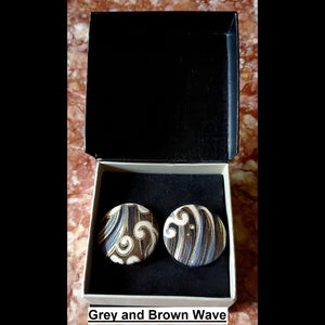 Grey and brown wave print button earrings in jewelry box