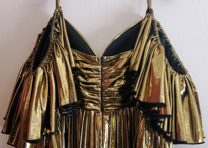 Back top view of gold ruffled dress