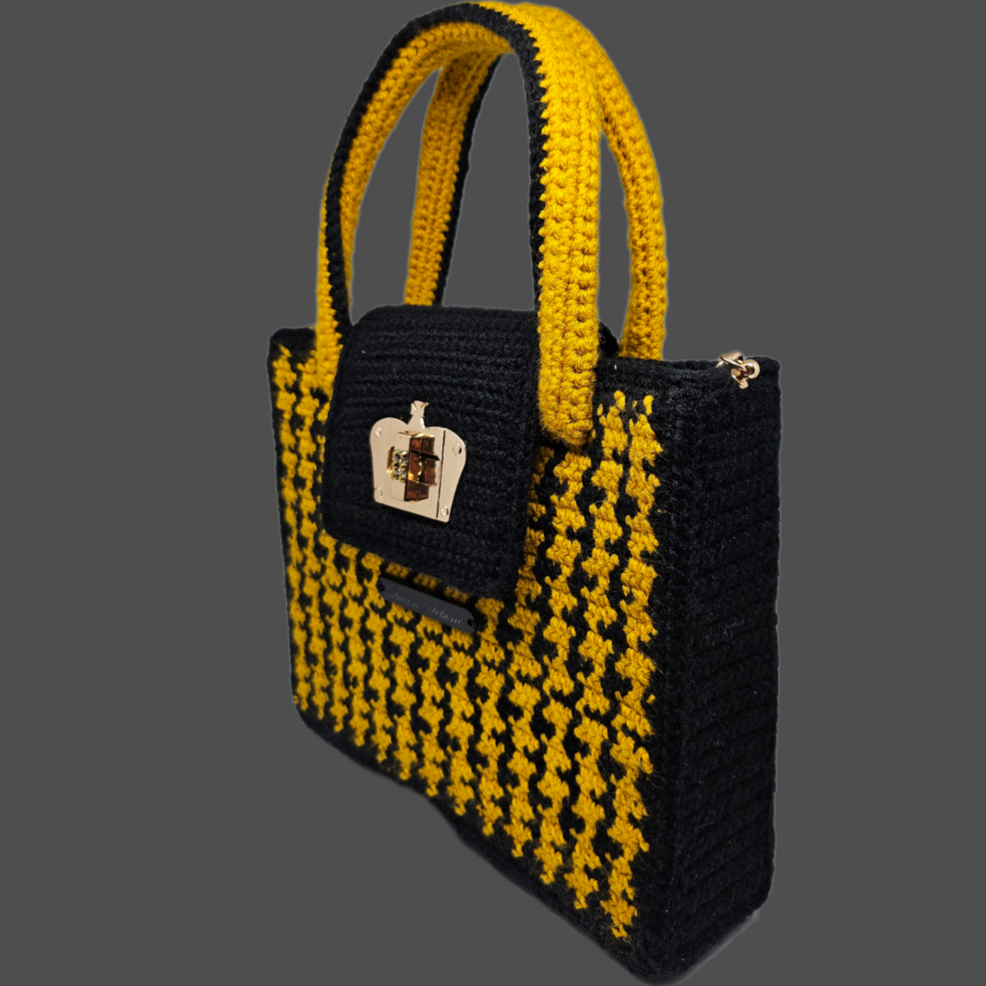 Side view of Black and yellow houndstooth structured crocheted handbag