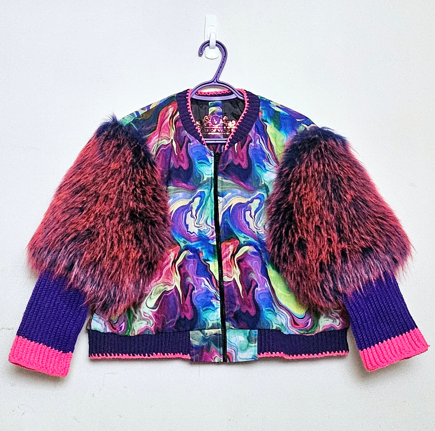 Front view of Rainbow bomber jacket with faux fur puffed sleeves