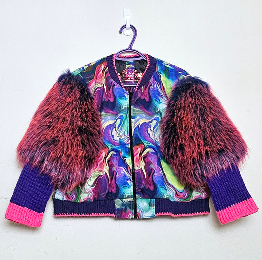Front view of Rainbow bomber jacket with faux fur puffed sleeves