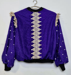 Back view of Rhinestone encrusted purple silk bomber jacket with gold lace accents