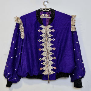 Front view of Rhinestone encrusted purple silk bomber jacket with gold lace accents