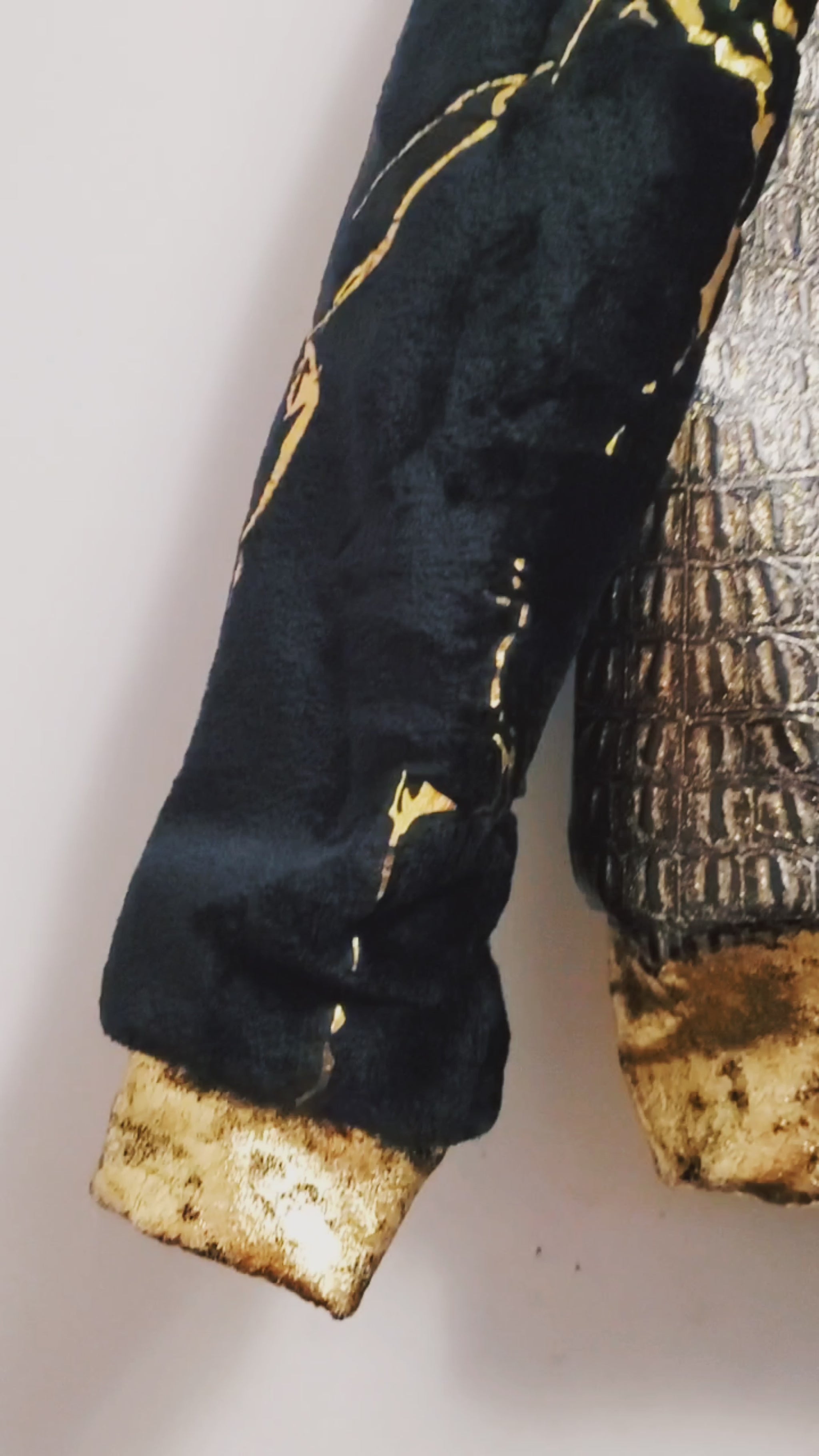 Video  of Faux alligator and marbled fur bomber jacket