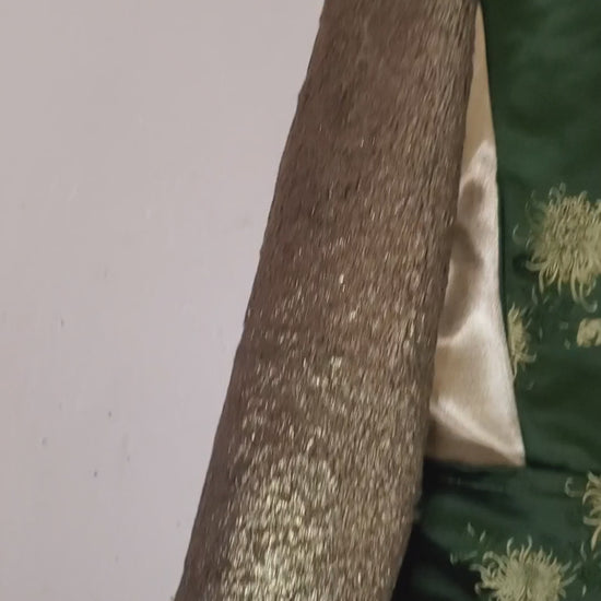 Video of Floral Green Silk moto jacket with bronze fur sleeves