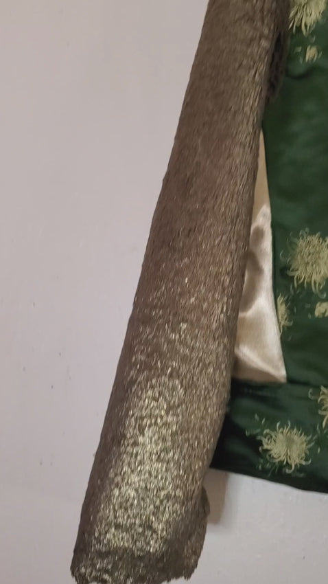 Video of Floral Green Silk moto jacket with bronze fur sleeves