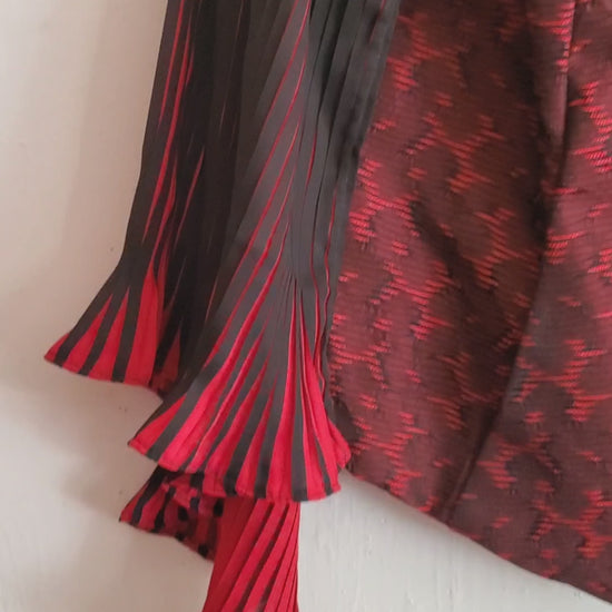 video of red and black moto jacket