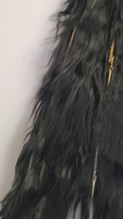 video of faux fur black coat with chain and spike details 