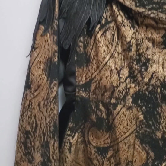 Video of 2 piece black and gold paisley suit with lace wing epaulettes