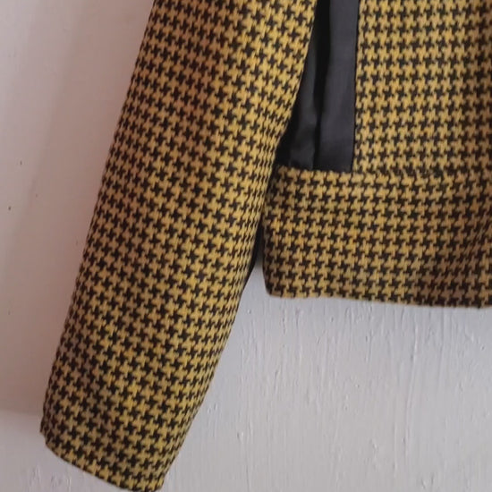 video of yellow houndstooth moto jacket