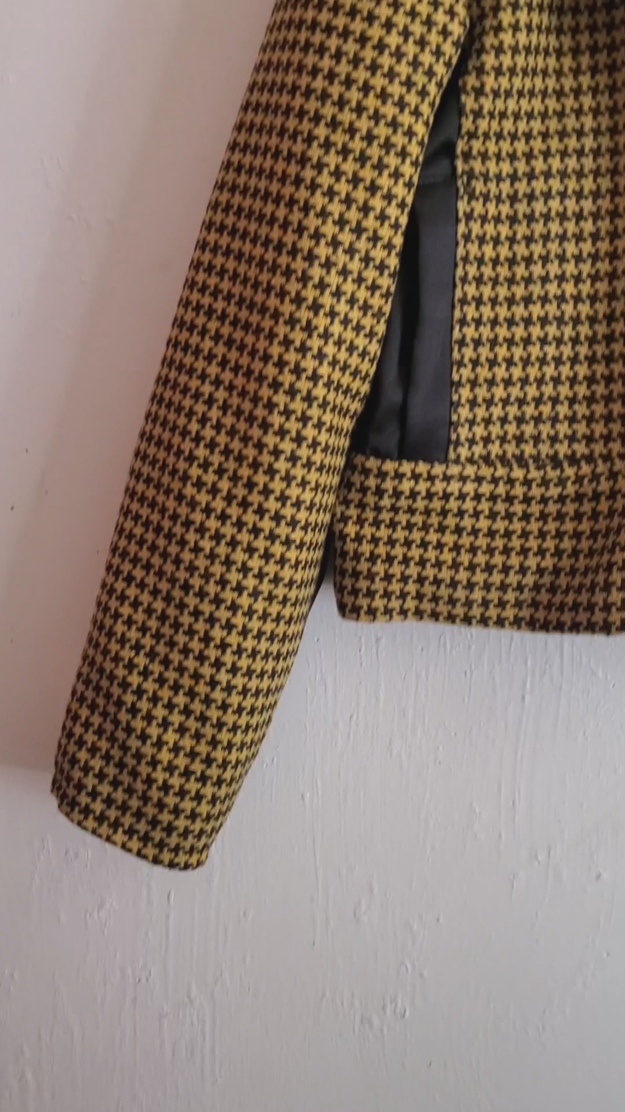 video of yellow houndstooth moto jacket