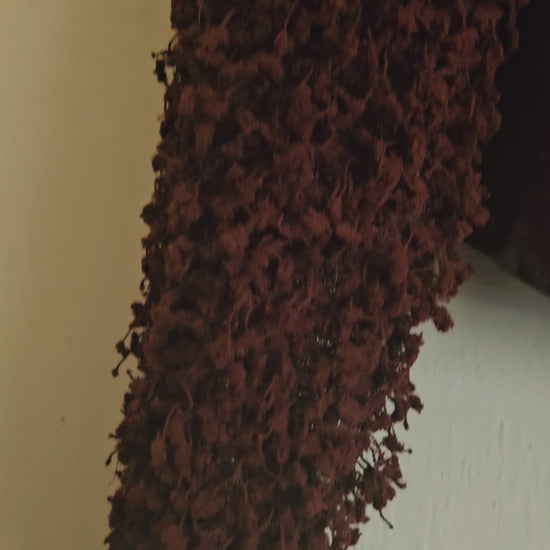 Video of burgundy croc embossed cropped jacket with fringe knit sleeves