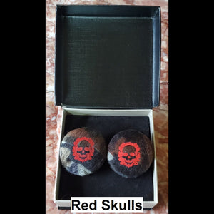 Red skull and velvet camo print button earrings in jewelry box