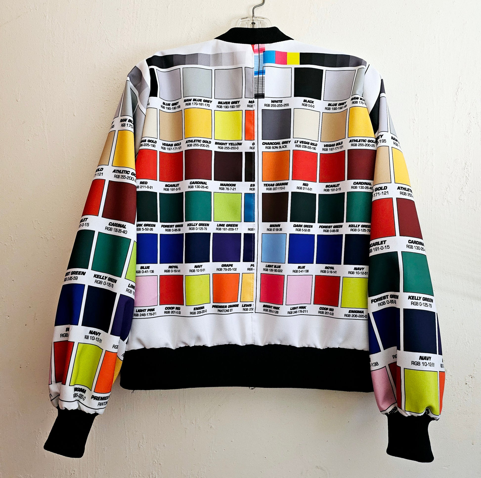Back view of Multi-coloured bomber jacket made from RGI colour code swatches