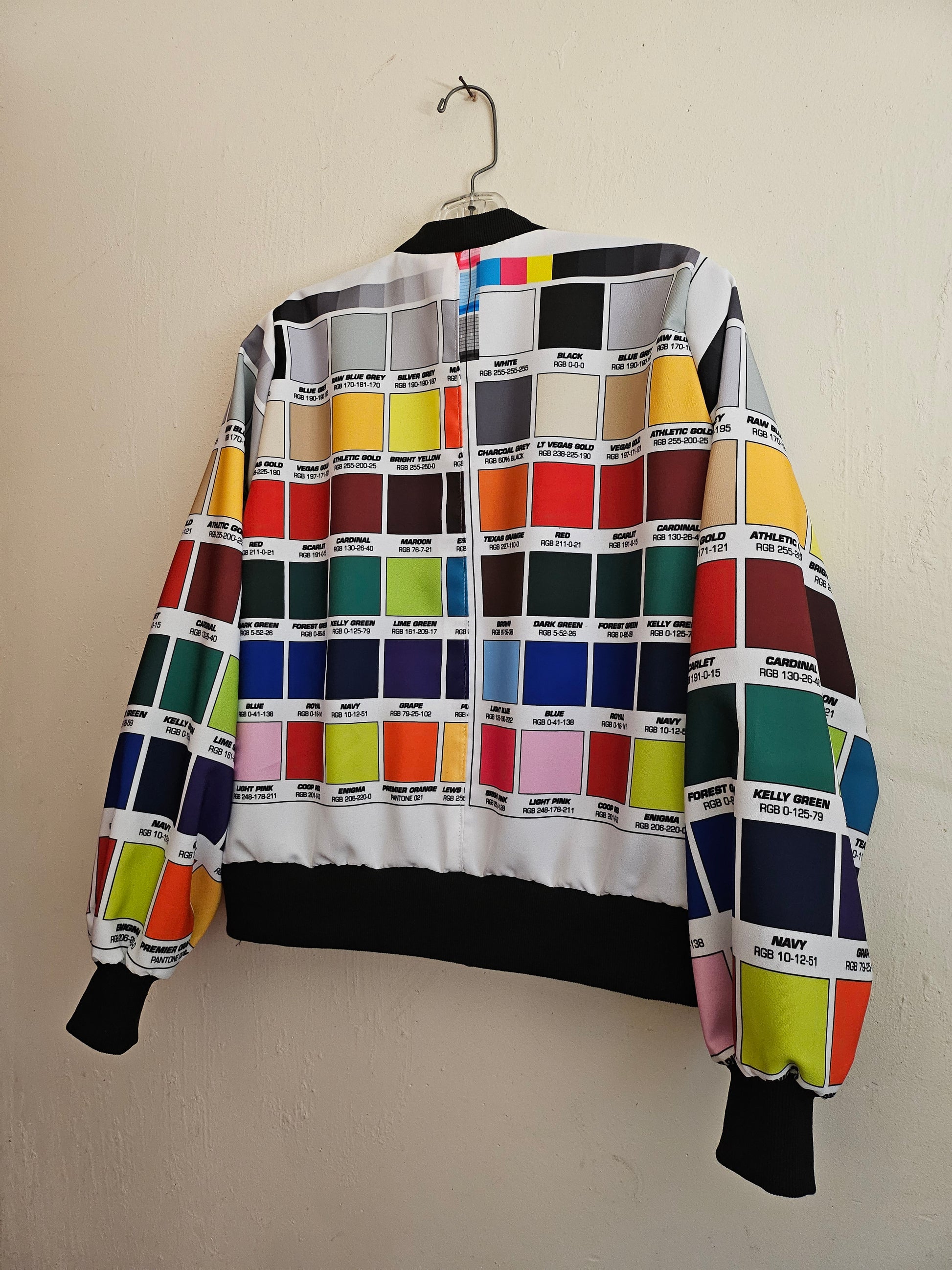 Side back view of Multi-coloured bomber jacket made from RGI colour code swatches