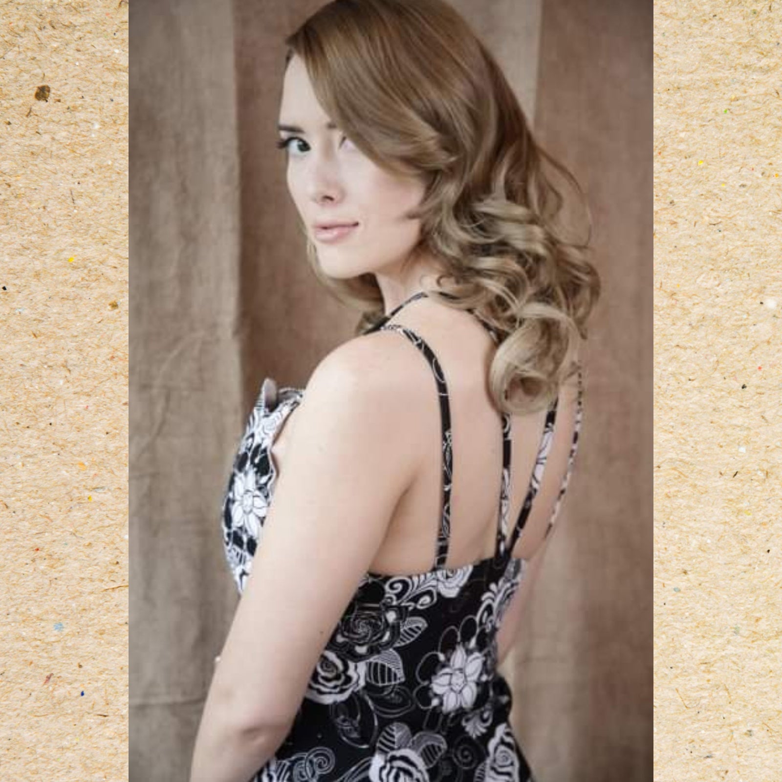 Back view of Black and White Abstract Floral Summer Dress on model